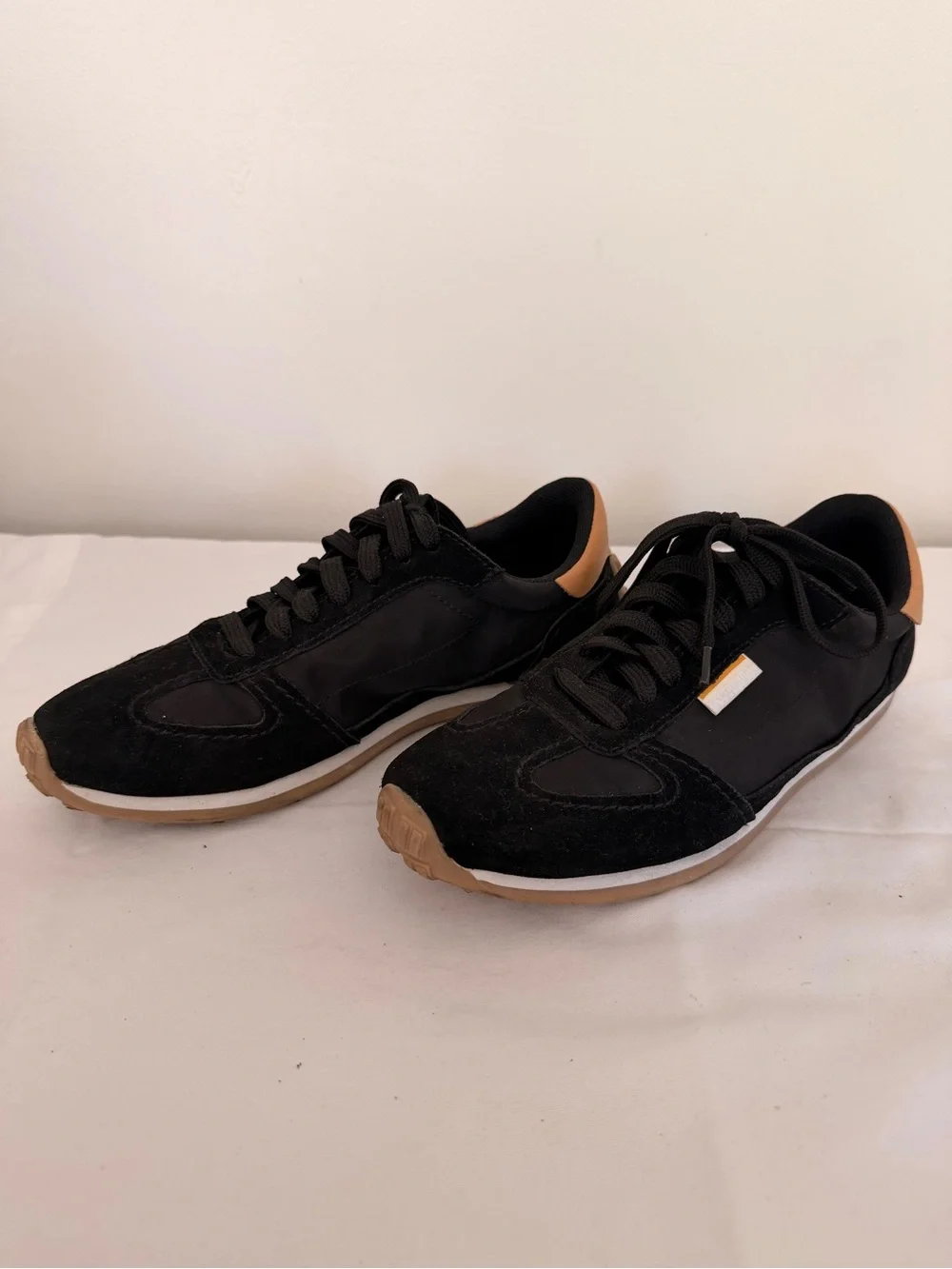 Zara Black Sneakers with Tan Heel Trim